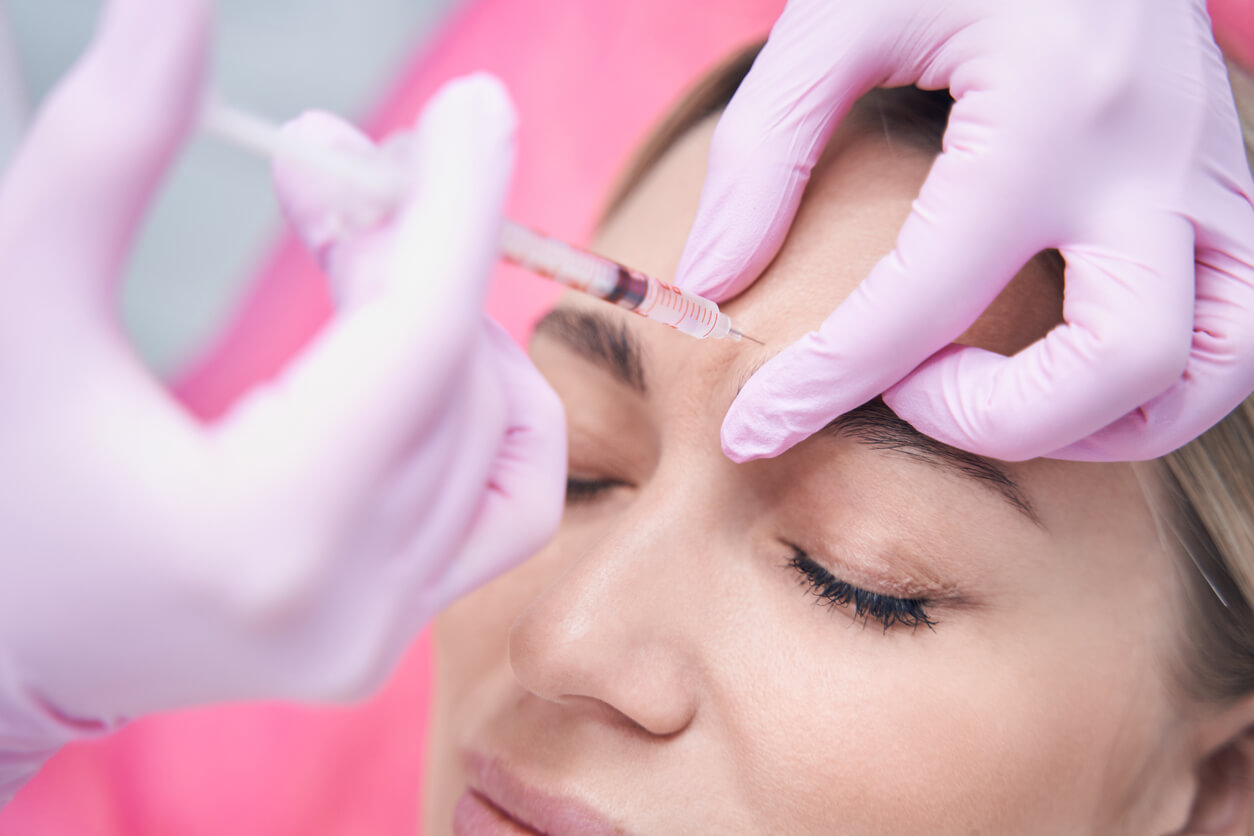 Treatment of frown lines with Botox or filler